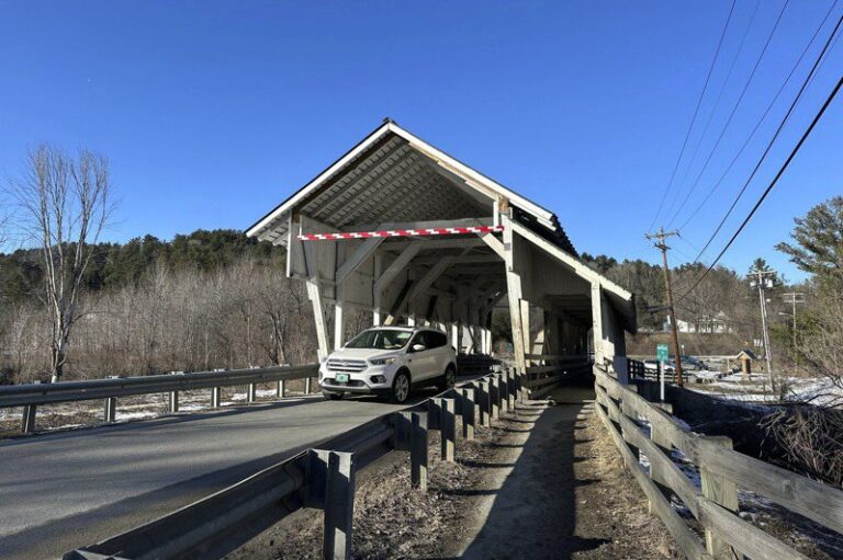 GPS-guided road and historic covered bridge frequently hit by trucks